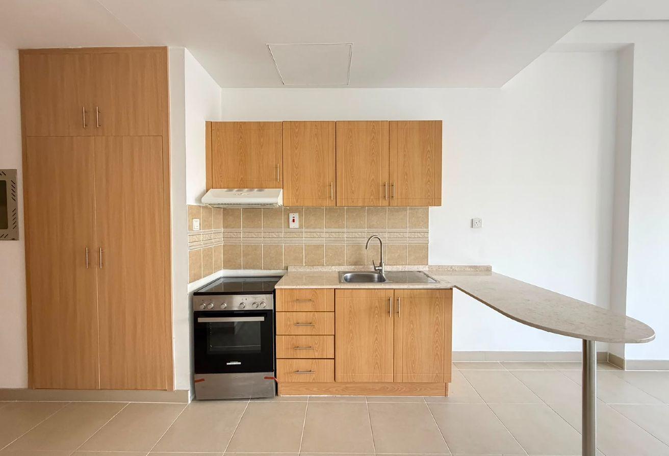 Open-plan 1BR | ASB Tower | Balcony with City Vie photo 9
