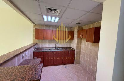 Apartment - 1 Bedroom - 2 Bathrooms for rent in Building P15 - France Cluster - International City - Dubai Apartment - 1 Bedroom - 2 Bathrooms for rent in Building P15 - France Cluster - International City - Dubai