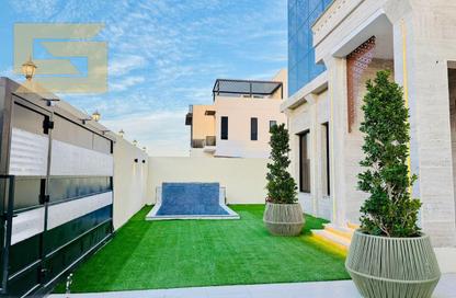 Villa - 6 - 7+ for sale in Orchid Towers - Tiger Downtown Ajman - Al Alia - Ajman Villa - 6 - 7+ for sale in Orchid Towers - Tiger Downtown Ajman - Al Alia - Ajman