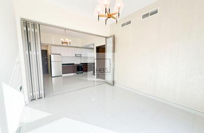Apartment - 1 - 1 for sale in Wavez Residence - Liwan - Dubai