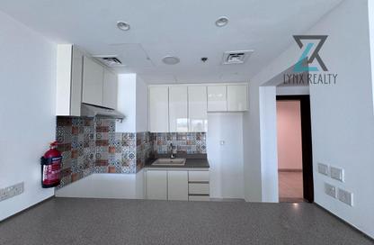 Apartment - 1 Bedroom - 2 Bathrooms for rent in Rabdan Building - Motor City - Dubai