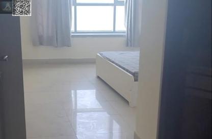 Apartment - 2 Bedrooms - 3 Bathrooms for sale in Corniche Tower - Ajman Corniche Road - Ajman