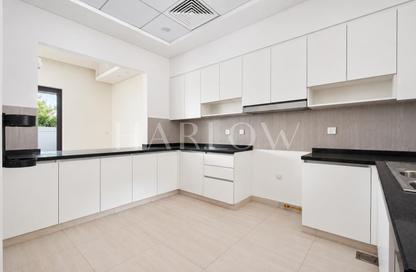 Townhouse - 4 - 4 for rent in Sevilla Village - Victory Heights - Dubai Sports City - Dubai