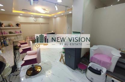 Shop - Studio - 1 for rent in Thuraya Al Majaz Building - Al Majaz 3 - Al Majaz - Sharjah