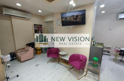 Shop - Studio - 1 for rent in Thuraya Al Majaz Building - Al Majaz 3 - Al Majaz - Sharjah
