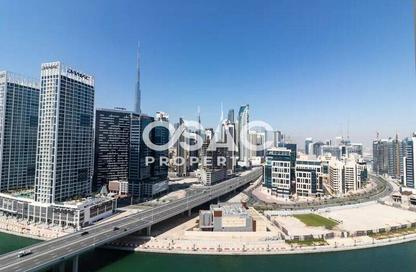Apartment - 3 - 3 for sale in Mayfair Residency - Business Bay - Dubai