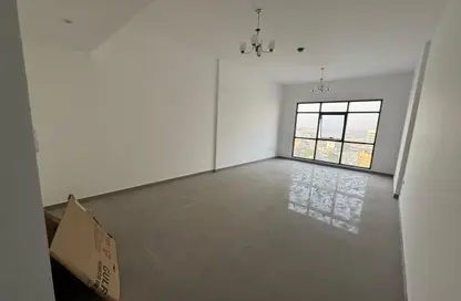Apartment - 1 Bedroom - 2 Bathrooms for rent in Geepas Building 5 - Al Bustan - Ajman