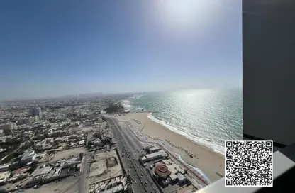 Apartment - 1 Bedroom - 2 Bathrooms for sale in Corniche Tower - Ajman Corniche Road - Ajman