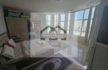 شقة - غرفة نوم - 2 حمامات للبيع في أورينت تاور 1 - أورينت تاور - البستان - عجمان