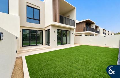 Townhouse - 4 - 4 for rent in Jebel Ali Village Townhouses - Jebel Ali Village - Jebel Ali - Dubai