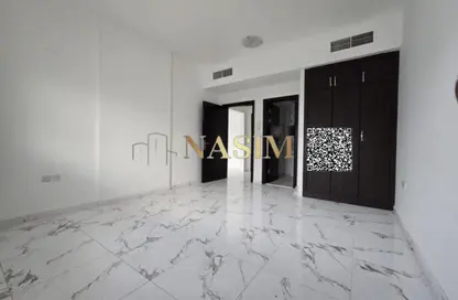 شقة - غرفة نوم - 2 حمامات للايجار في مبنى جيباس 3 - الراشدية 2 - الراشدية - عجمان