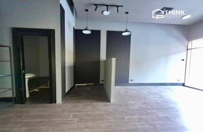 Shop - Studio - 1 Bathroom for rent in Al Shafar Park Tower - Al Karama - Dubai