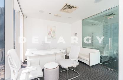 Office Space - Studio - 1 Bathroom for rent in The Prism - Business Bay - Dubai