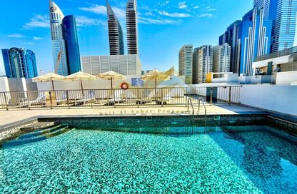 Apartment - 1 Bedroom - 2 Bathrooms for rent in Jumeirah Garden City - Al Satwa - Dubai