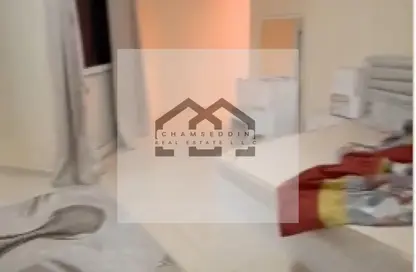 شقة - غرفة نوم - 2 حمامات للبيع في أورينت تاور 1 - أورينت تاور - البستان - عجمان