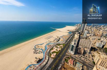 Apartment - 2 Bedrooms - 3 Bathrooms for sale in Corniche Tower - Ajman Corniche Road - Ajman