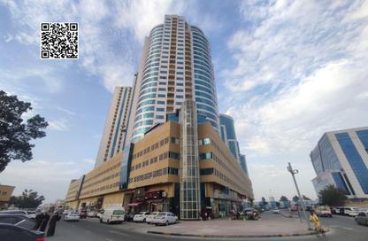 شقة - غرفة نوم - 2 حمامات للايجار في أورينت تاور 1 - أورينت تاور - البستان - عجمان