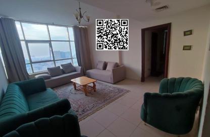 شقة - غرفة نوم - 2 حمامات للايجار في أورينت تاور 1 - أورينت تاور - البستان - عجمان