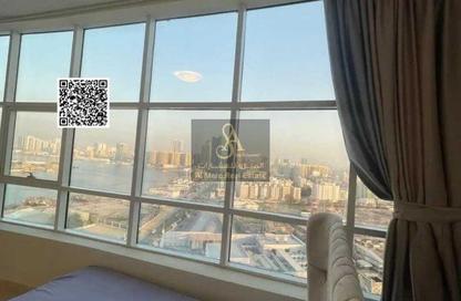 Apartment - 2 Bedrooms - 2 Bathrooms for sale in Orient Tower 1 - Orient Towers - Al Bustan - Ajman