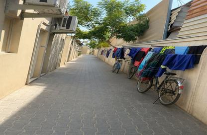 سكن عمال - استوديو - 7+ للايجار في المنطقة الصناعية رقم 12 - المنطقة الصناعية بالشارقة - الشارقة