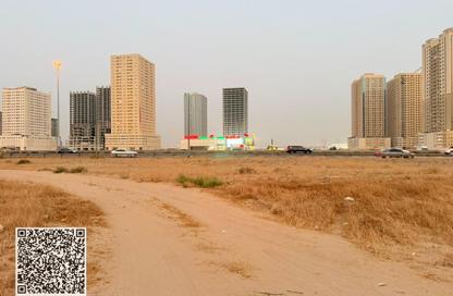 Land - Studio for sale in Orchid Towers - Tiger Downtown Ajman - Al Alia - Ajman