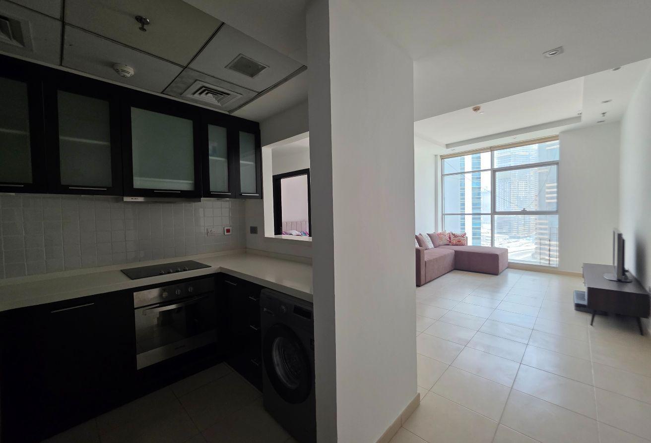 FURNISHED 1 BHK | MID FLOOR | POOL VIEW photo 2