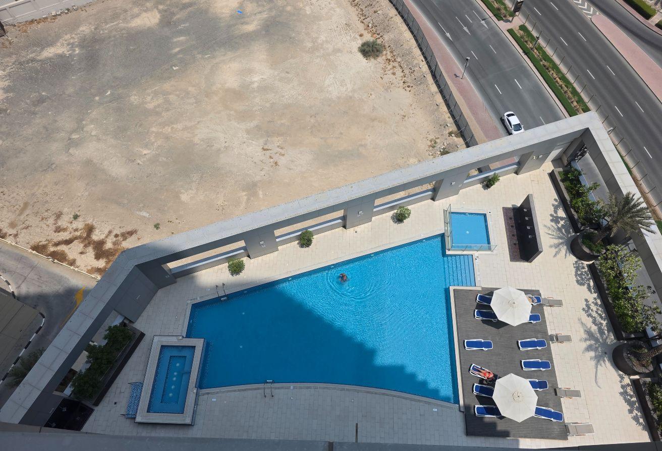 FURNISHED 1 BHK | MID FLOOR | POOL VIEW photo 13