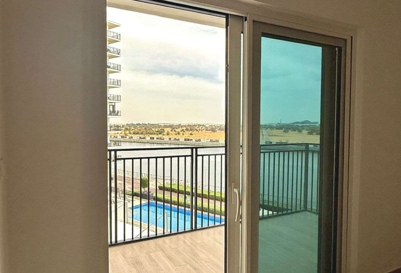 Canal & Pool View | Elegant 2BR | Ideal Location
