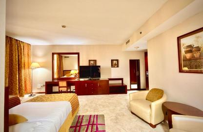 Apartment - Studio - 1 Bathroom for rent in Tourist Club Area - Abu Dhabi