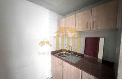 Shop - Studio - 1 Bathroom for rent in Building Z02 - England Cluster - International City - Dubai