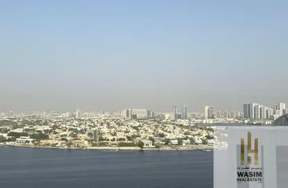 Apartment - 1 Bedroom - 2 Bathrooms for sale in Orient Towers - Al Bustan - Ajman