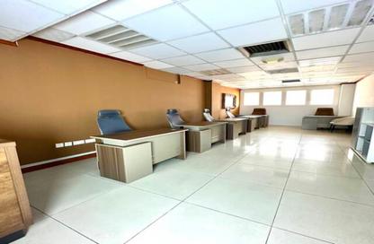 Business Centre - Studio - 2 Bathrooms for rent in Al Kazim Building - Karama Park Area - Al Karama - Dubai
