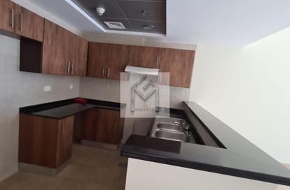 Apartment - 1 - 2 for rent in Golf View Residence - Dubai Sports City - Dubai