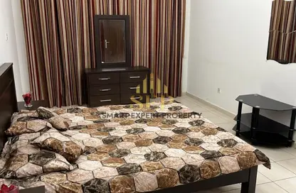 شقة - غرفة نوم - 2 حمامات للايجار في إس01 - طراز أسباني - المدينة العالمية - دبي