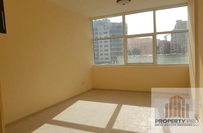 Apartment - Studio - 1 Bathroom for rent in Silicon Gates 4 - Silicon Gates - Dubai Silicon Oasis - Dubai