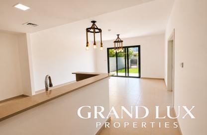 Townhouse - 4 - 4 for rent in Noor Townhouses - Town Square - Dubai