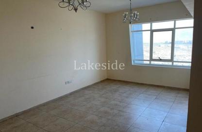 Apartment - 1 Bedroom - 2 Bathrooms for rent in Ahmed Al Murr Building - Dubai Silicon Oasis - Dubai