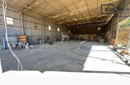 Warehouse - Studio - 4 Bathrooms for rent in Umm Ramool - Dubai