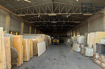 Warehouse - Studio - 4 Bathrooms for rent in Umm Ramool - Dubai