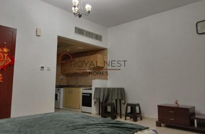 Apartment - Studio - 1 Bathroom for rent in Building X26 - England Cluster - International City - Dubai