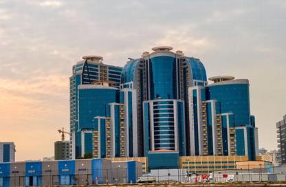 شقة - غرفة نوم - 2 حمامات للبيع في أورينت تاور 1 - أورينت تاور - البستان - عجمان