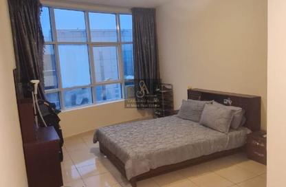 Apartment - 2 Bedrooms - 2 Bathrooms for sale in Orient Tower 1 - Orient Towers - Al Bustan - Ajman