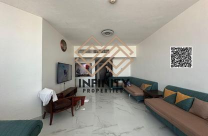 Apartment - 2 Bedrooms - 2 Bathrooms for sale in Orient Tower 1 - Orient Towers - Al Bustan - Ajman