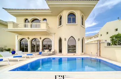 Villa - 5 Bedrooms - 6 Bathrooms for rent in Garden Homes Frond E - Garden Homes - Palm Jumeirah - Dubai