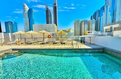 Apartment - 1 Bedroom - 2 Bathrooms for rent in Jumeirah Garden City - Al Satwa - Dubai