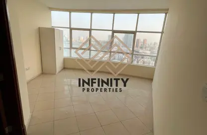 شقة - غرفة نوم - 2 حمامات للبيع في أورينت تاور 1 - أورينت تاور - البستان - عجمان