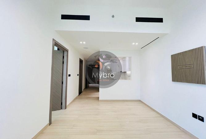 1BR | Binghatti Nova | Balcony & City View photo 3