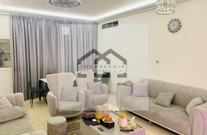 Apartment - 2 Bedrooms - 2 Bathrooms for sale in Orient Tower 1 - Orient Towers - Al Bustan - Ajman