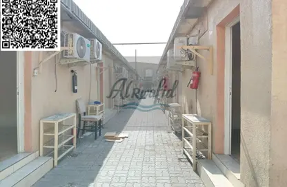 سكن عمال - استوديو - 8 حمامات للايجار في المنطقة الصناعية 15 - المنطقة الصناعية بالشارقة - الشارقة