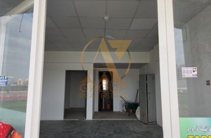 Shop - Studio for rent in Building Z04 - England Cluster - International City - Dubai